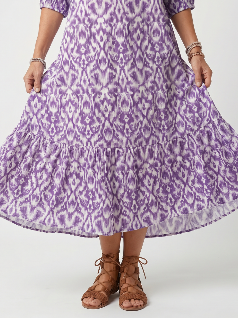 Penélope vestido midi estampado con lazo de borlas