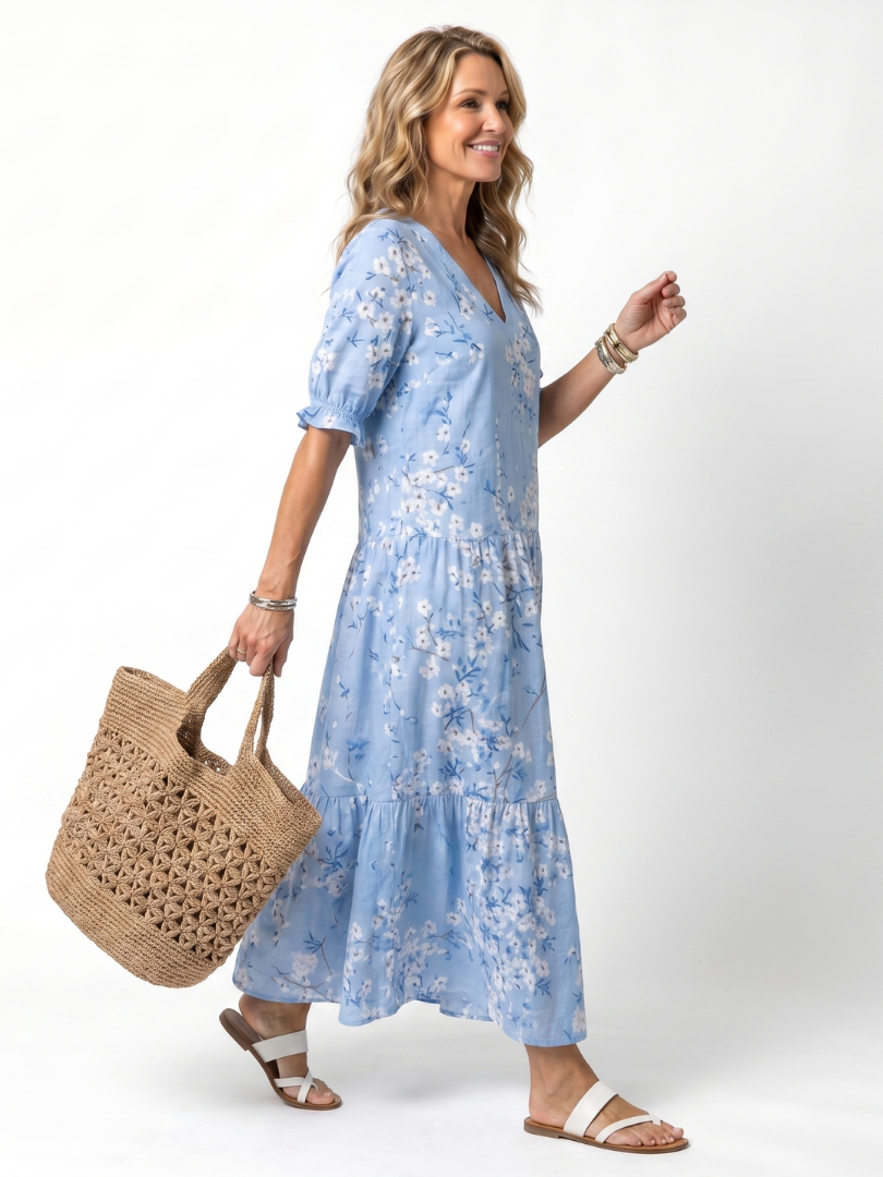 Alora vestido midi floral con lazo de borlas