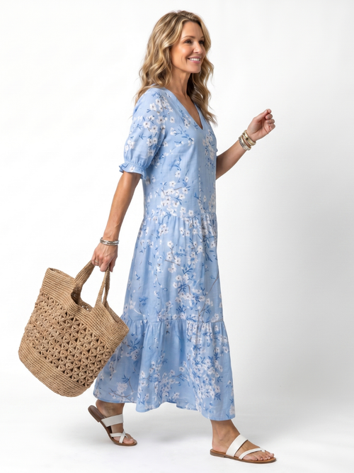 Alora vestido midi floral con lazo de borlas