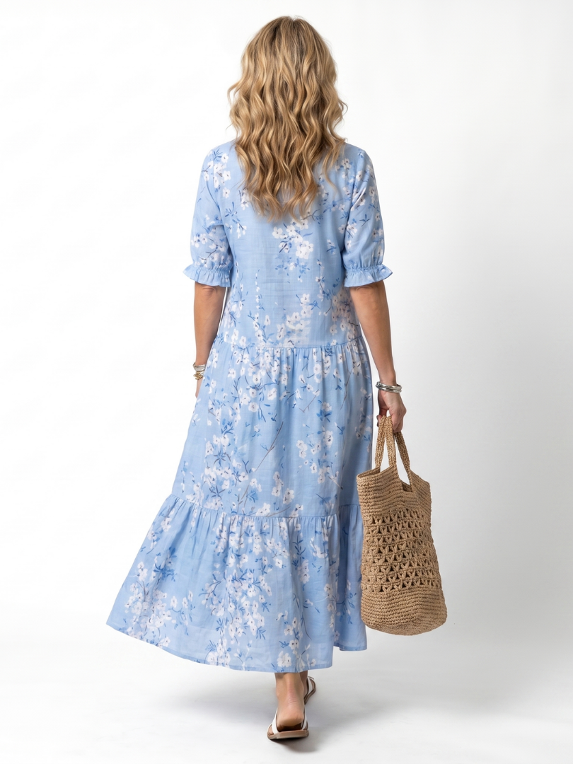 Alora vestido midi floral con lazo de borlas